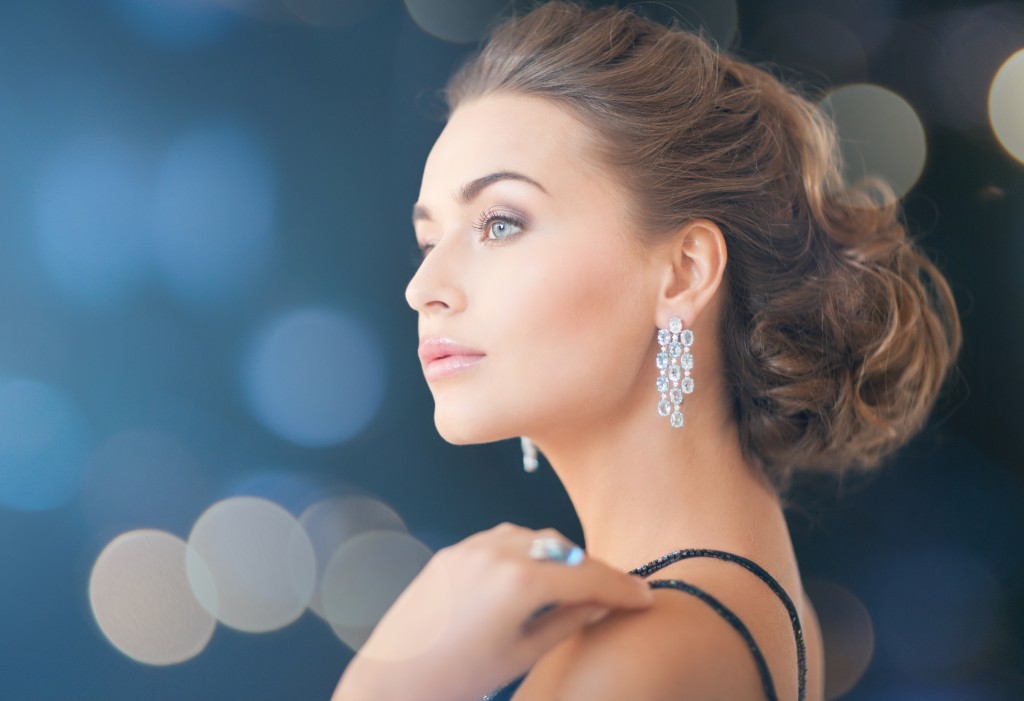 woman with diamond earrings