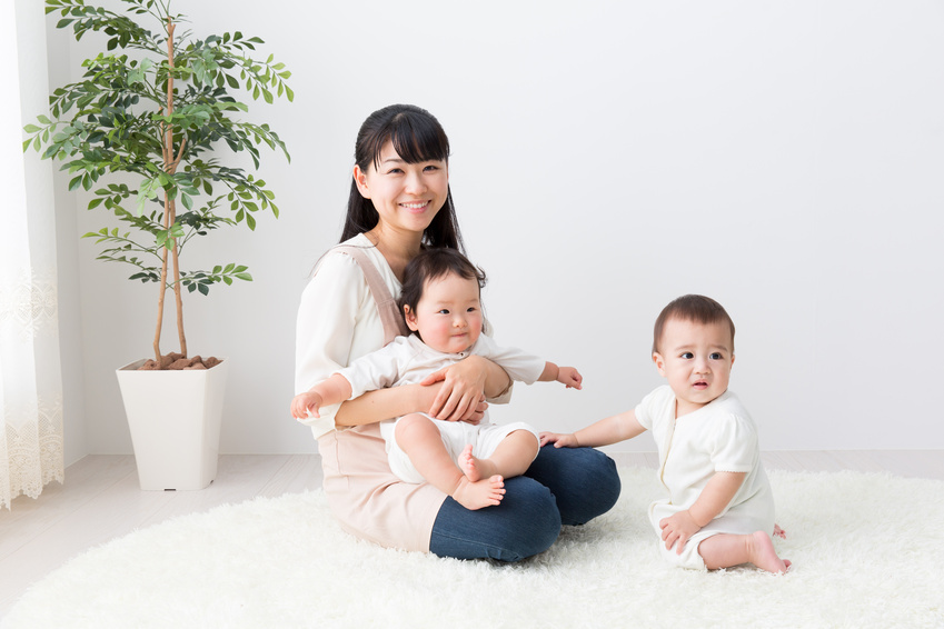 asian babys and mother in the room