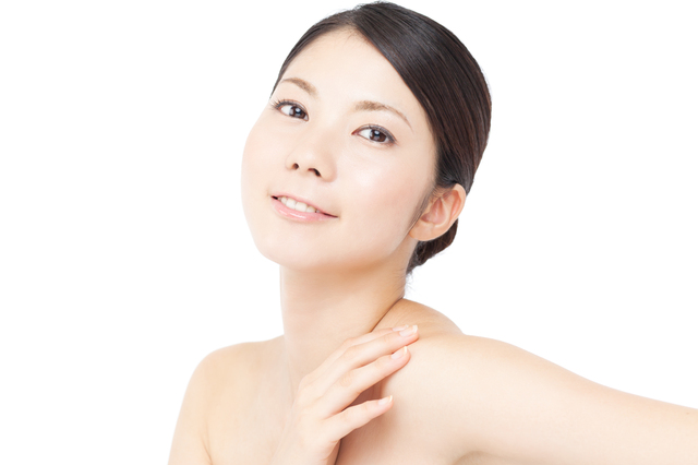 Beautiful young woman on white background. Portrait of asian.